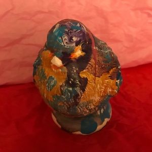 Ceramic bird painted by a child